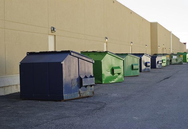 a site supervisor checking a construction dumpster in Chuluota, FL